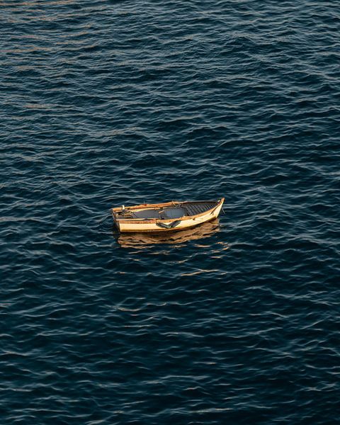 Floating fishing boat in Italy by Visuals by Justin