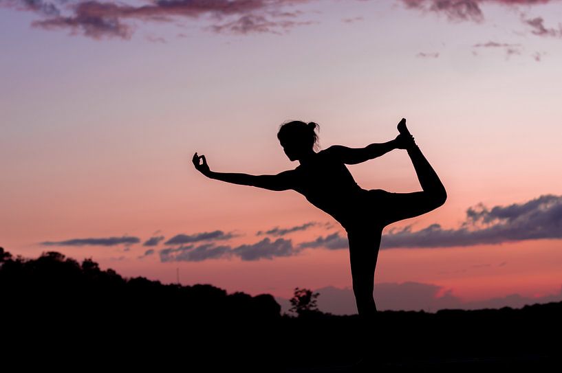 Yoga pose at sunset. by Manon Moller Fotografie