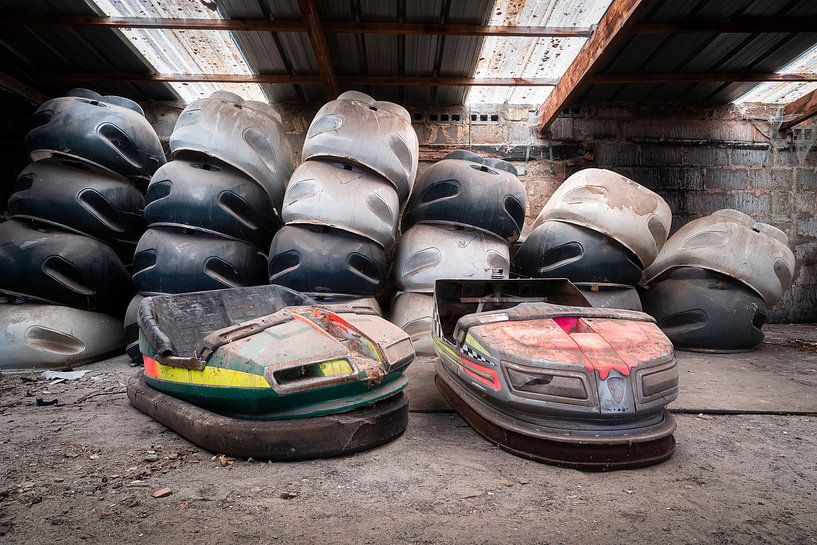 Abandoned Bumper Cars in Garage. by Roman Robroek - Photos of Abandoned Buildings