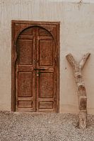 Wooden door Terre des Etoilles in the Agafay desert