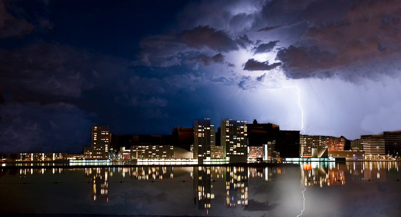 Almere skyline with lightning striking the city. by Brian Morgan