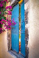 View through santorini with beautiful bougainvillea flowers