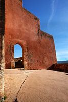 Façade de maison rouge à Roussillion