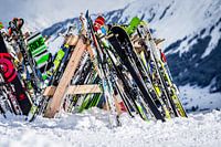Skis and snowboards waiting for new trip