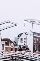 Grave stone bridge over the Spaarne in winter Haarlem