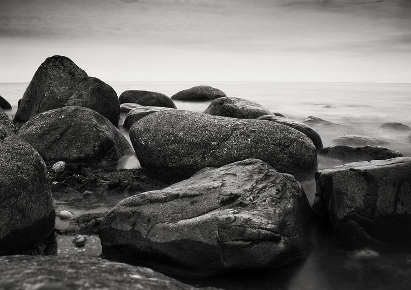 Stones on the shore of the sea by Frank Herrmann