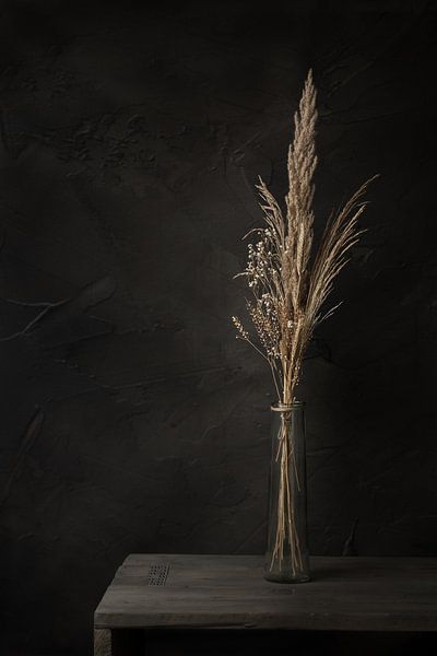 Dark still life with dried flowers on old wooden table by Mayra Fotografie