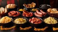 Traditionele Duitse gerechten met worst, zuurkool en brood