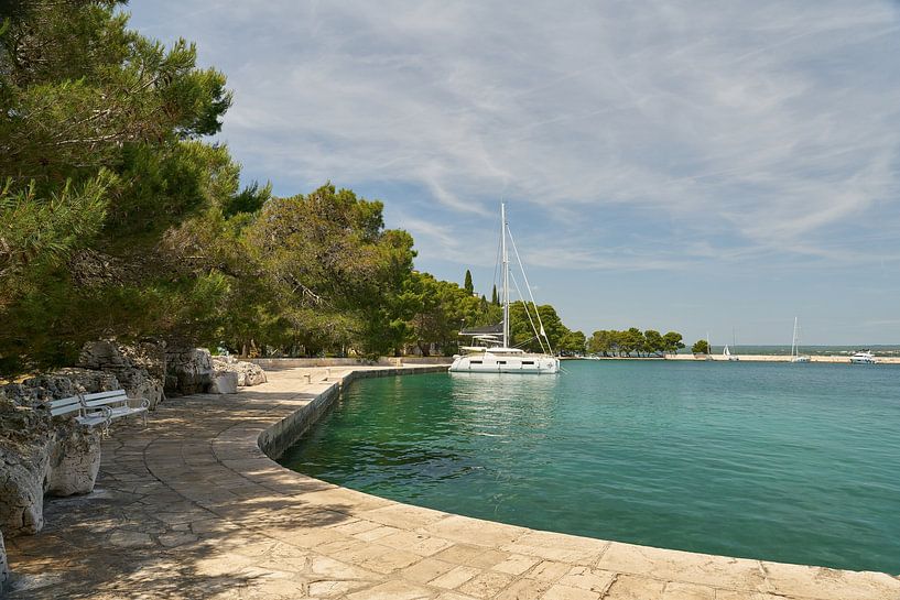 Waterfront promenade on the island of Veliki Brijun by Heiko Kueverling