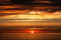 Die Sonne versinkt im Meer