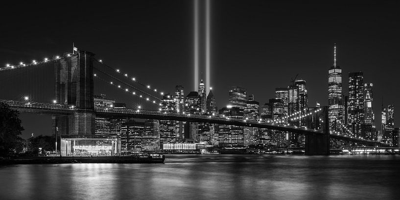 New York City skyline and Brooklyn Bridge at night in black and white - September 11 memorial by Tux Photography