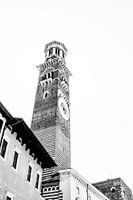 Church tower with buildings in central Verona (black and white)
