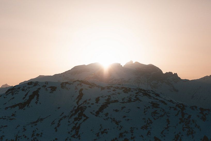 The sun disappears behind the mountains by Sophia Eerden