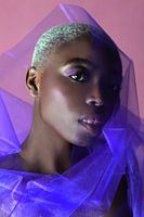 Portrait of a Woman with Purple Tulle and Pink Background