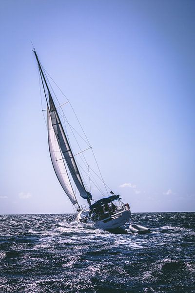 Sailing boat in the waters of the Amalfi coast in Italy by Ken Tempelers
