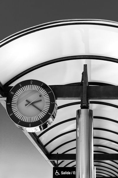 Abstract image - Detail railwaystation hood and railway clock by Marianne van der Zee