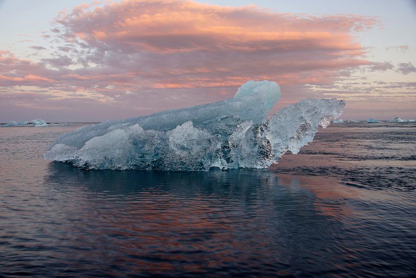 gliding ice lump on the beach by henk Tigchelaar