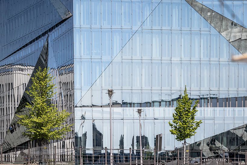 reflections at Cube Berlin in Berlin from the water by Eric van Nieuwland