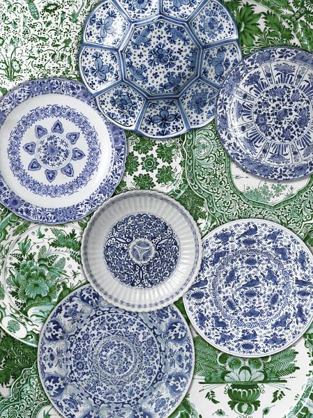 Collection of Delft blue plates on green background, Rijksmuseum by Mijke Konijn