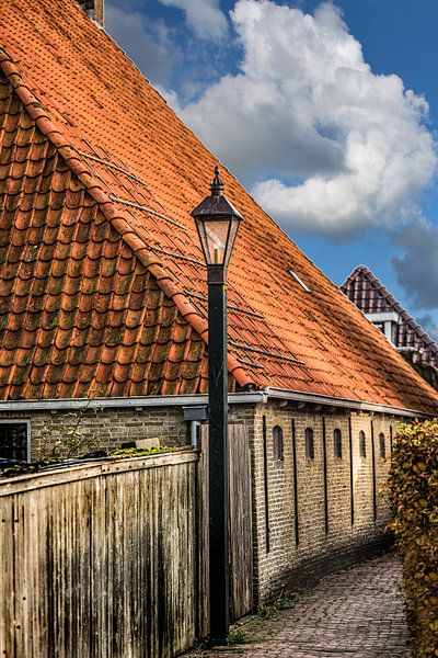 Alley in the Frisian town of Hindeloopen on the IJsselmeer by Harrie Muis