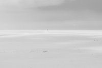 Two people on a deserted sandy plain in Spain. Wout Cook One2expose
