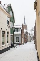Dorfstraße mit Schnee in Moordrecht, Niederlande.