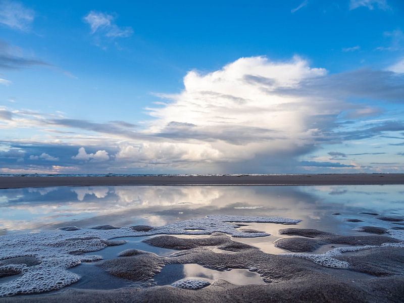 Reflection on the beach by Frank Wijsmuller