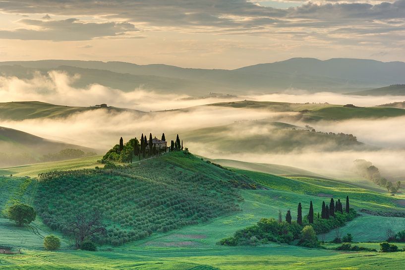 Morning mist in the Val d'Orcia in Tuscany by Michael Valjak