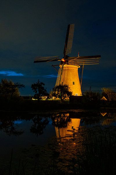 Illuminated windmills Kinderdijk. by Gerrit van de Velde