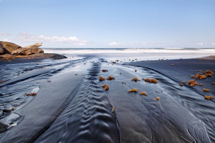 Dark beach with sand ribs by Ralf Lehmann