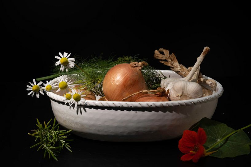 Old metal bowl with onions and garlic by Gaby Hendriksz