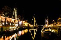 Christmas time in Dokkum, Friesland. Boats with lights