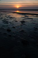 Zonsondergang aan de waddenzee