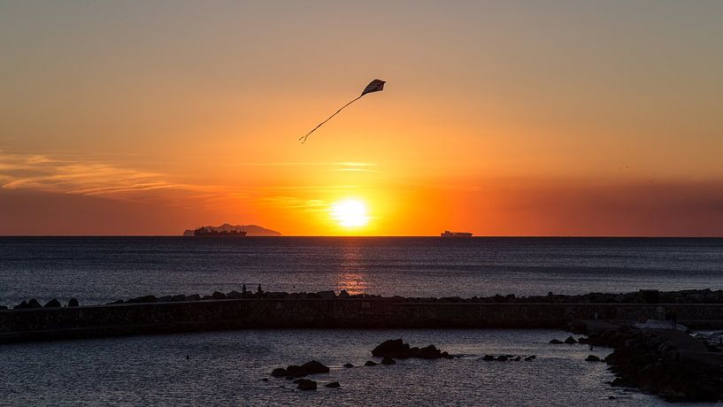 Sunset with kite, Livorno, Italy by Guido van Veen