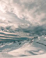 Snowy mountains at sunset in the French Alps