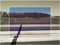 ein Rotorblatt eines Tragschraubers auf der Startbahn