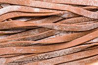 Fresh cocoa tagliatelle pasta (detail)