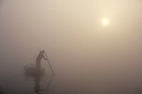 Rameur dans le brouillard