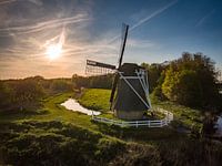 Windmolen met zon