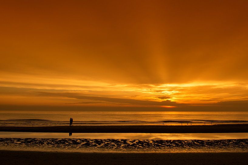 Love at sunset by Dick van Duijn