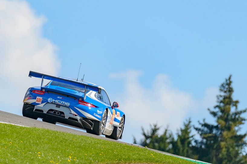 Porsche 911 RSR race car driving up Eau Rouge by Sjoerd van der Wal Photography