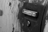 Porte de Cadillac rouillée noir blanc Ratlook