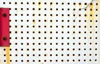 Panneau à trous abstraits