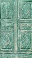Old door in the colour green