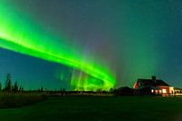 Aurores boréales au-dessus du Myrkulla Lodge - Un ciel magique au-dessus de l'immensité suédoise