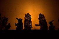 Indonesian shadow puppets on a canvas