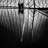 The Louvre pyramid at night.