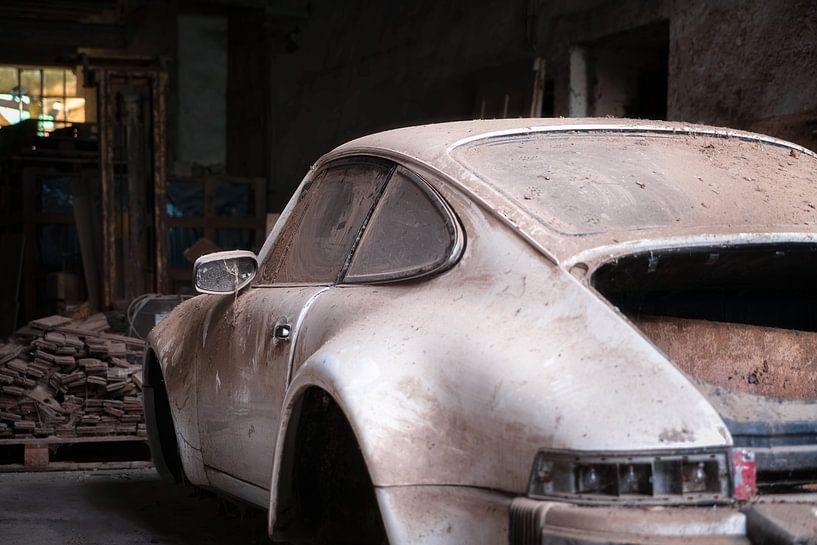 Abandoned Porsche in Garage. by Roman Robroek - Photos of Abandoned Buildings