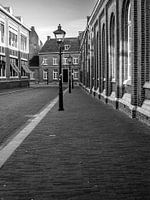Atmospheric street with lanterns in Sittard in black and white