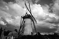 Mill at thunderclouds in black and white